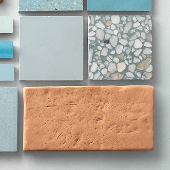Moodboard featuring terracotta and blue tiles